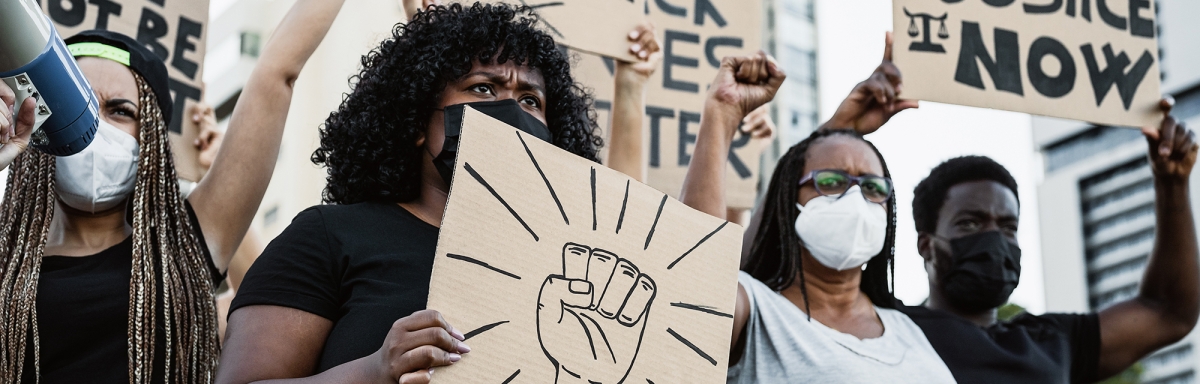 Demonstrators from different cultures and race protest on street for justice and equal rights