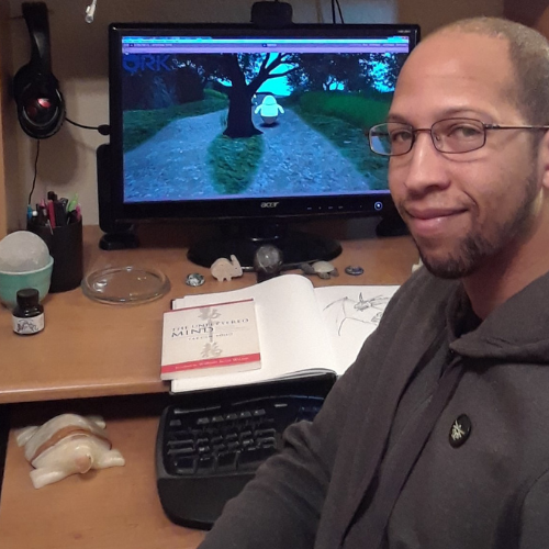 Person working at computer desk
