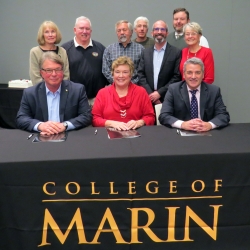 Rotary Club of Novato and COM signing agreement