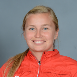 Image of a woman in an orange jacket