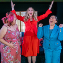 Three people expressing joy